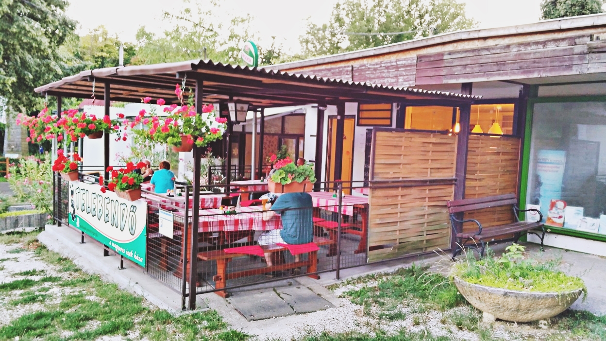 A tavern with red checked tablecloth in Balatonvilagos
