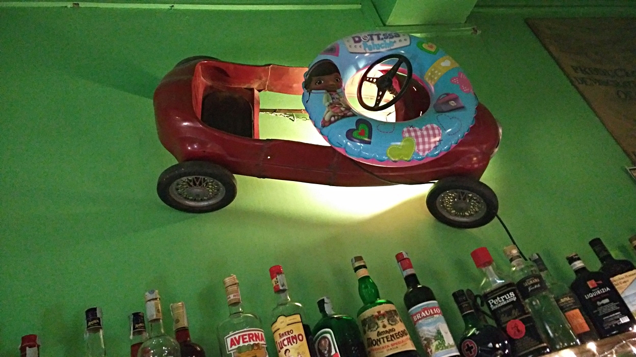 gokart on the wall in Il Piratello in Bologna - Pubtourist
